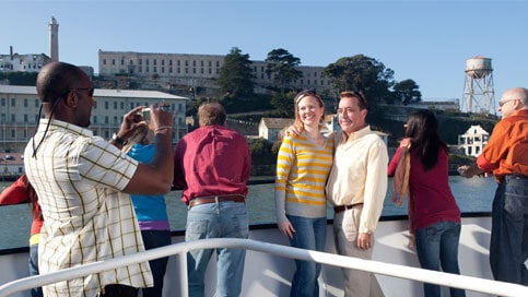 People on boat with Alcatraz in background