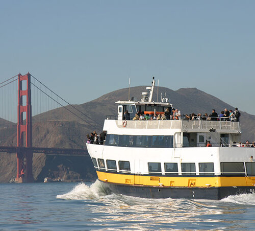 Boat sailing towards Golden Gate Bridge