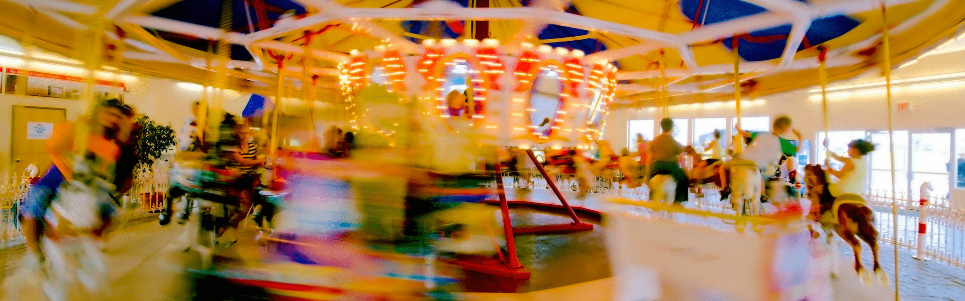 A carousel moving fast casing the image to blur