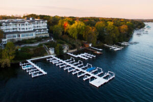 Lake Geneva Inn with a boat dock at the shore